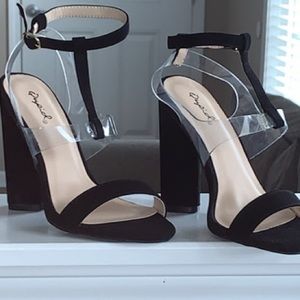 Brand new black heels with clear strap.